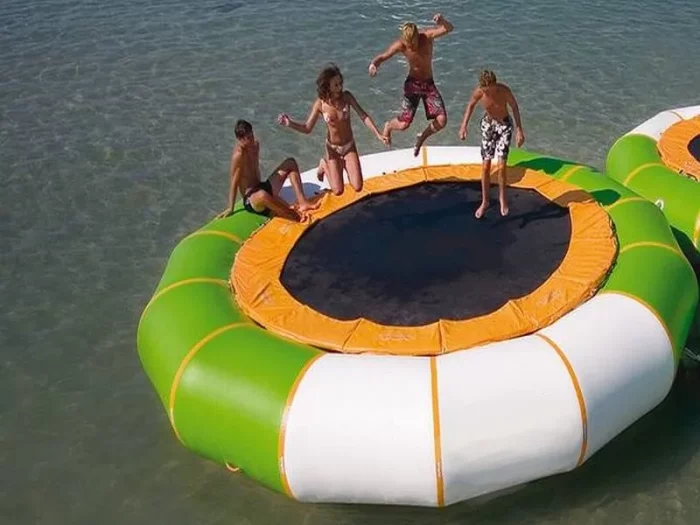 Inflatable water trampoline with green and white design, perfect for lakes and outdoor fun. Buy durable, high-quality options online in South Africa.