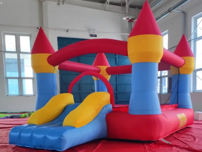 Colorful castle-themed inflatable jumping castle with slide, perfect for kids' parties. Buy affordable, high-quality options online in South Africa.