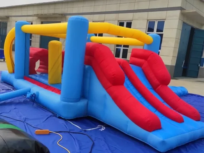 Inflatable jumping castle with dual red slides and play area, perfect for kids' parties and events. Buy affordable, high-quality options online in South Africa.